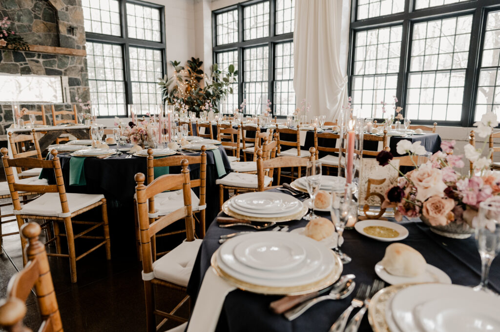 Indoor details and tablescape for a winter wedding at the Sinclair of Skaneateles. Featuring florals from Beck and Forth Co.