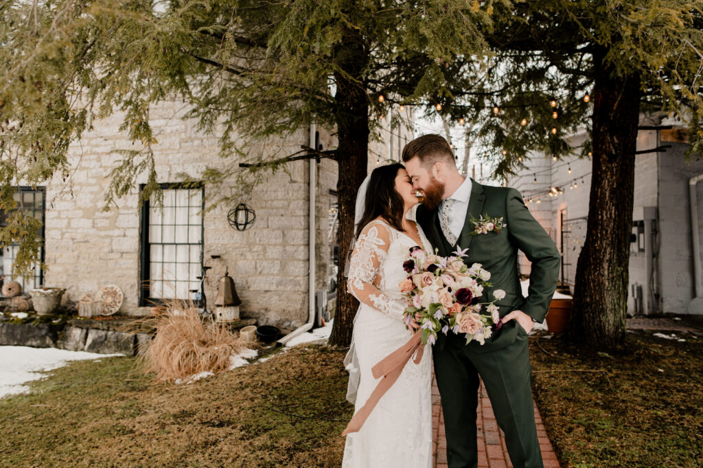 A bride and groom at their winter wedding at the Sinclair of Skaneateles.